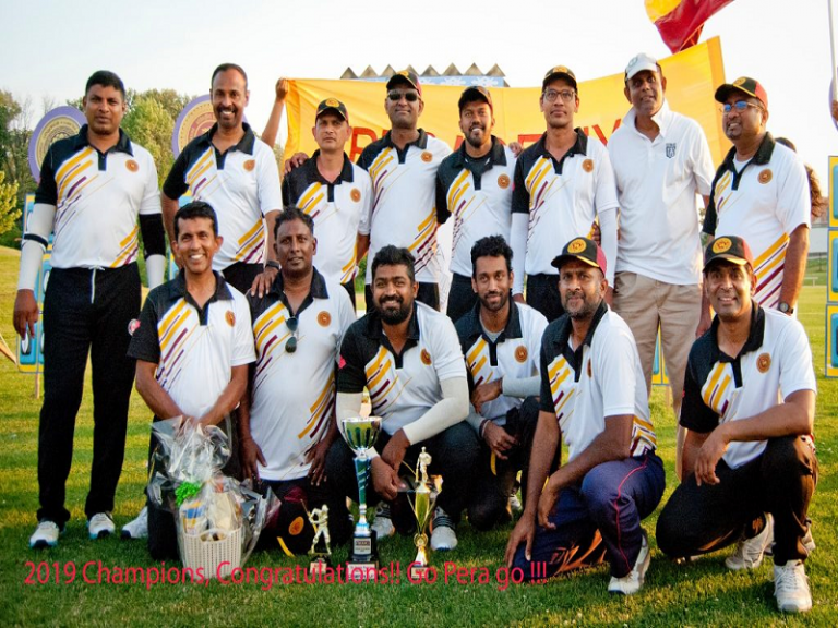 A photo of winning the Cricket trophy - Alumni Association of the University of Peradeniya GTA and Suburbs